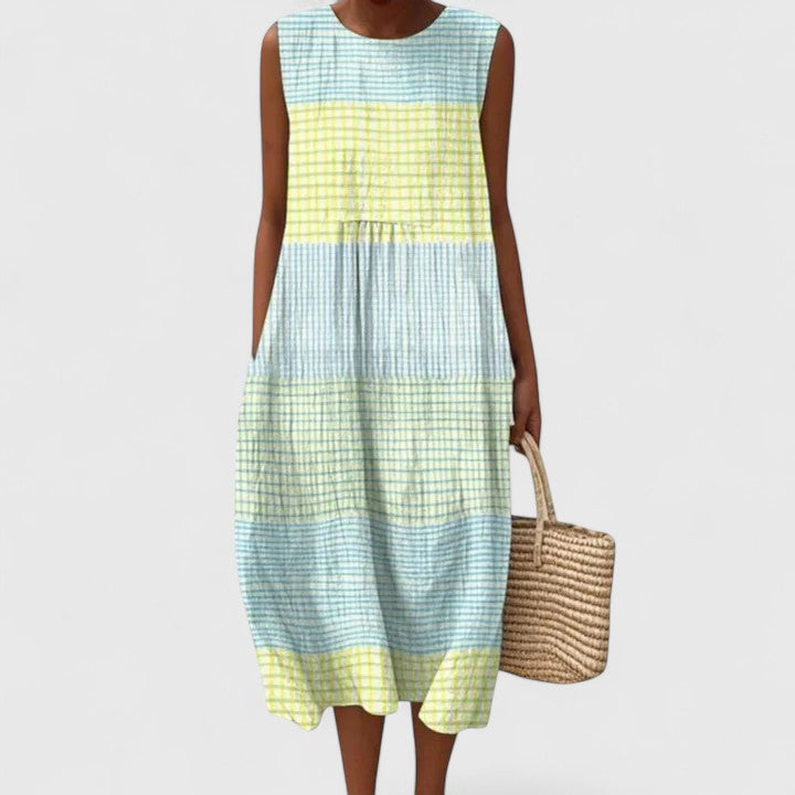 Women's comfortable midi dress, effortless style. Flattering knee-length casual wear for versatile summer fashion.