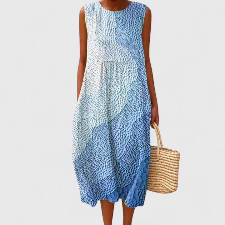 Elegant women's midi dress in soft fabric, comfortable and flattering. Perfect knee-length casual wear for easy summer style.