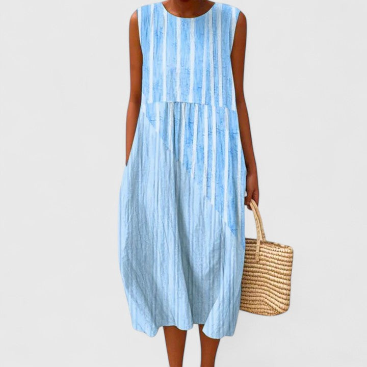 Effortless women's midi dress, super comfortable and easy to wear. Flattering knee-length for chic casual summer style.