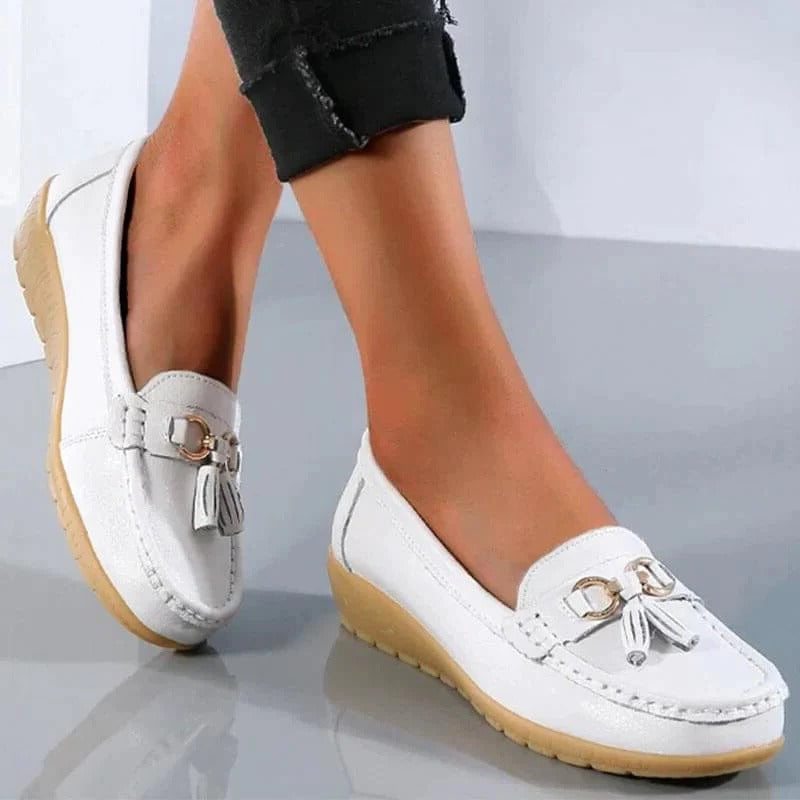 Black women's orthopedic loafers with deep arch support, designed for ultimate comfort and foot health.