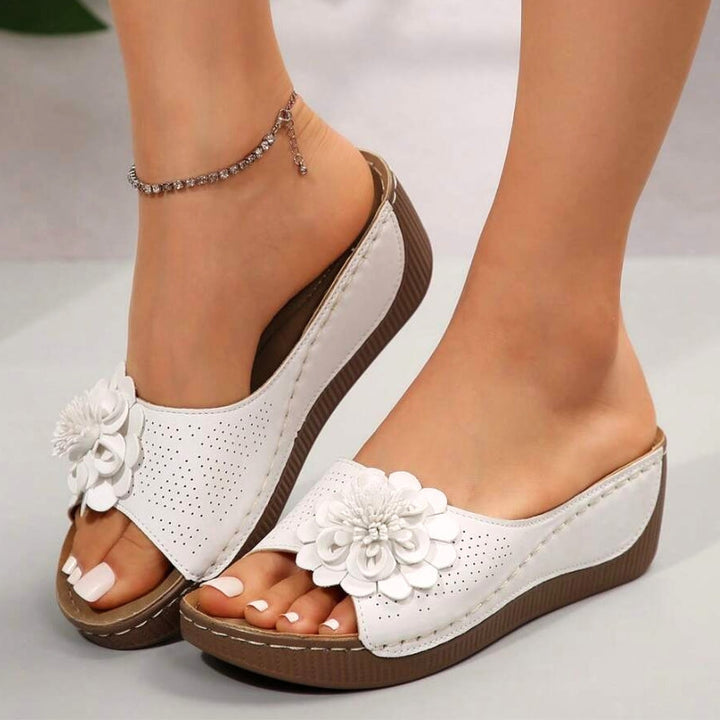 Women's comfortable orthopedic wedge sandals with arch support, perfect for everyday wear and walking.