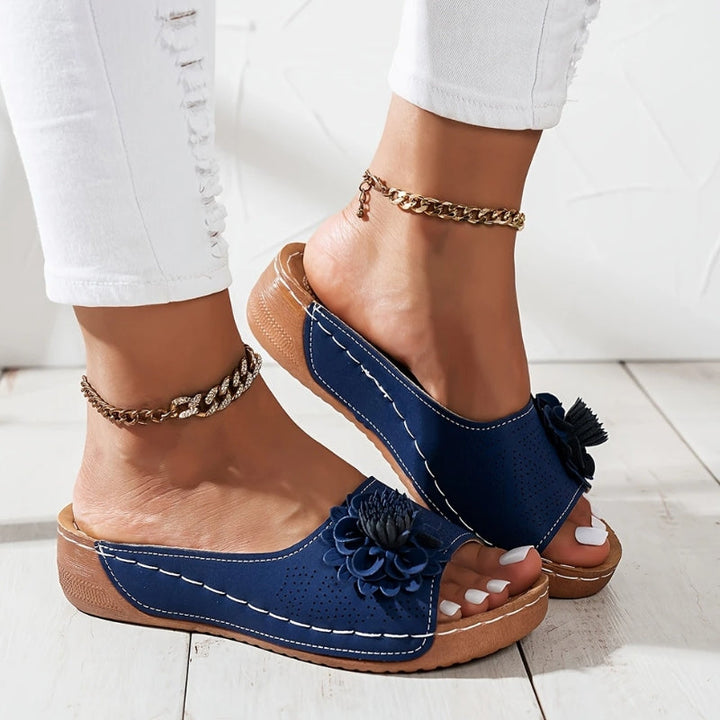 Comfortable women's orthopedic wedge sandals designed with arch support to relieve foot pain, perfect for walking.