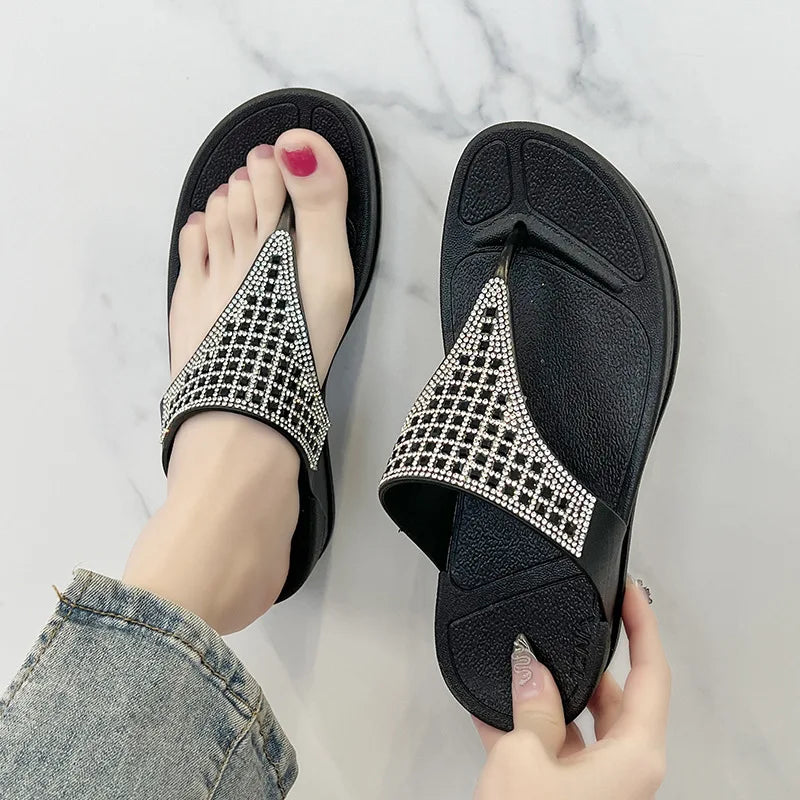 Women's Geneva platform slippers showcasing dazzling rhinestone details, a summer shoe essential