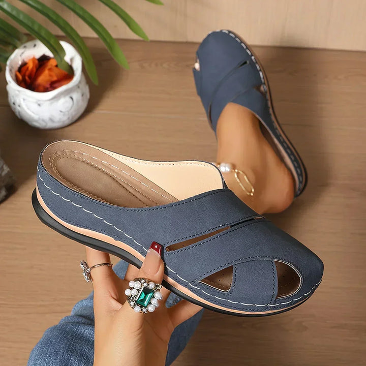 Comfortable women's wedge sandals with a supportive platform. Chic design for versatile summer fashion.