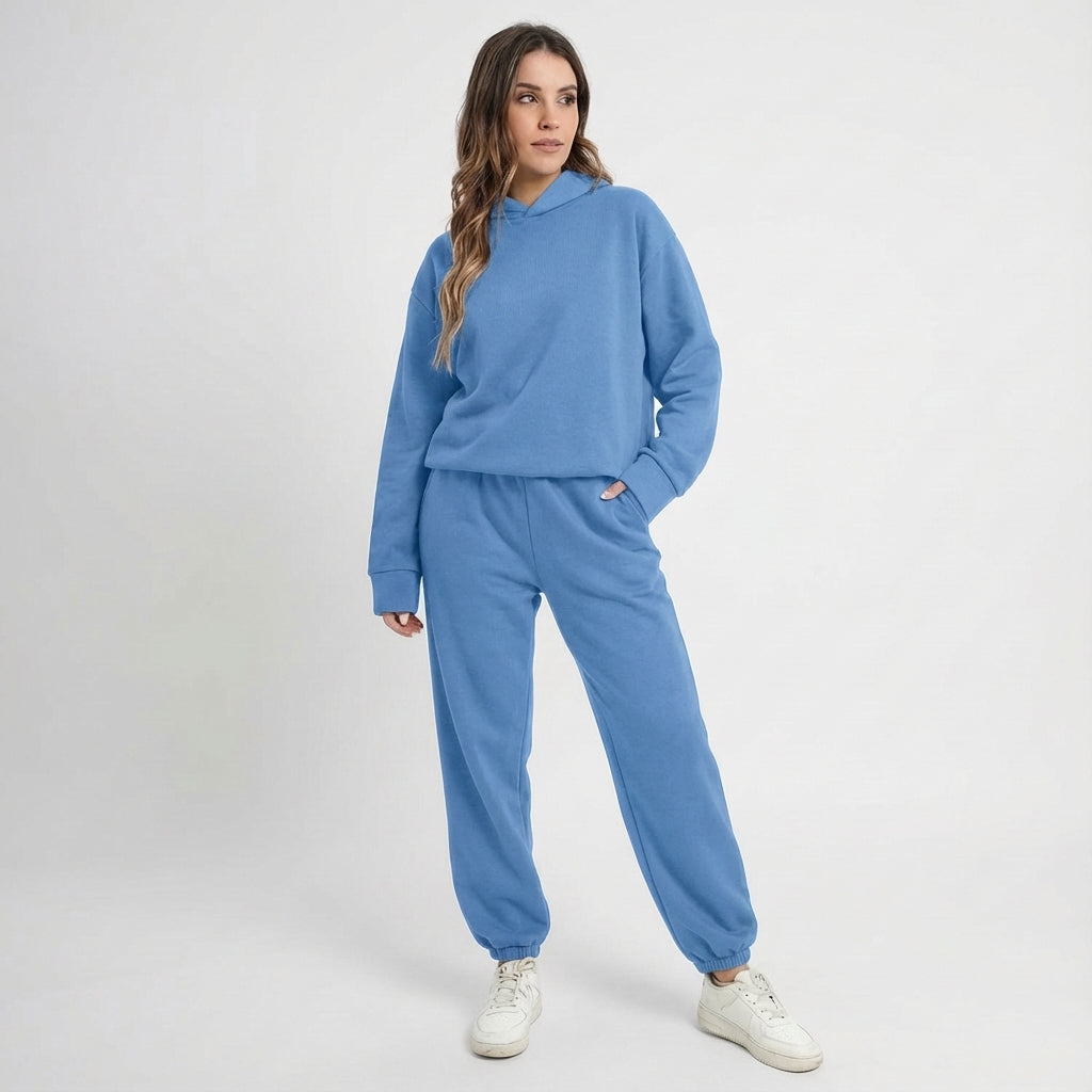 Back view of a woman wearing the versatile all-season women's tracksuit, perfect for sports or lounging