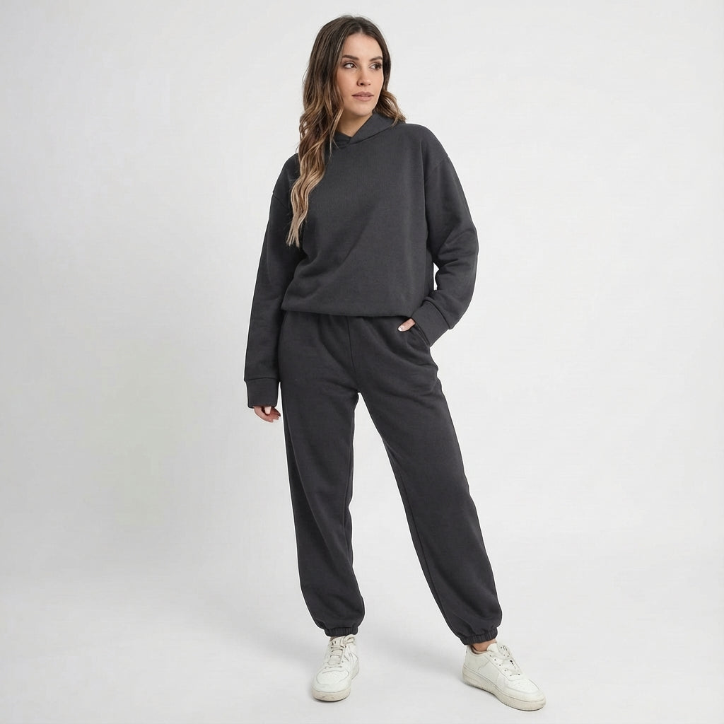 Front view of women's athletic tracksuit in blue, a comfortable polyester set for active and casual wear