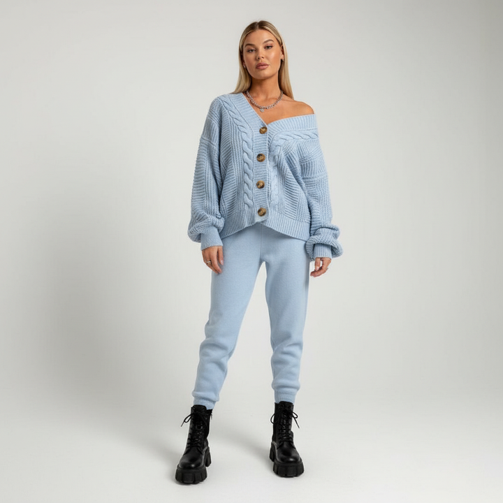 Full view of a woman wearing the comfortable ribbed knit button-down cardigan, ideal for layering.