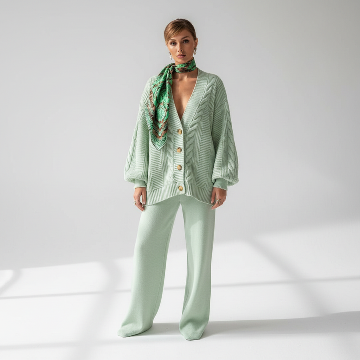 Long-sleeve ribbed knit cardigan for women, unbuttoned, draped for a relaxed loungewear look.