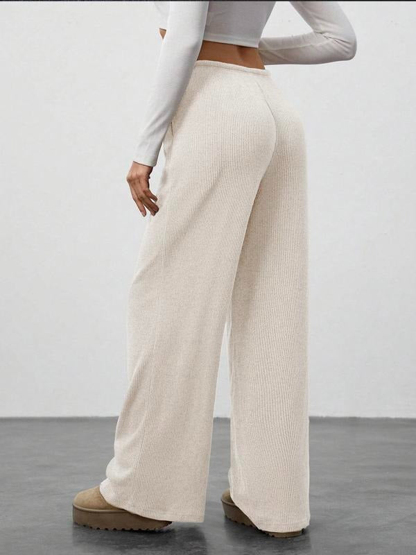 Stylish women's ribbed drawstring pants with a wide leg, designed for comfortable, relaxed loungewear.