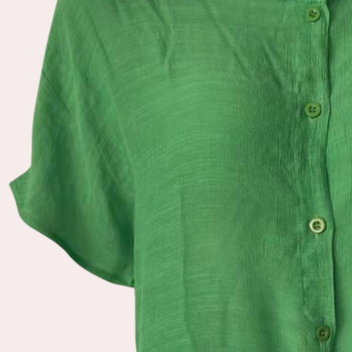 Back view of elegant women's short shirt dress, flowing fabric for comfortable everyday summer style.