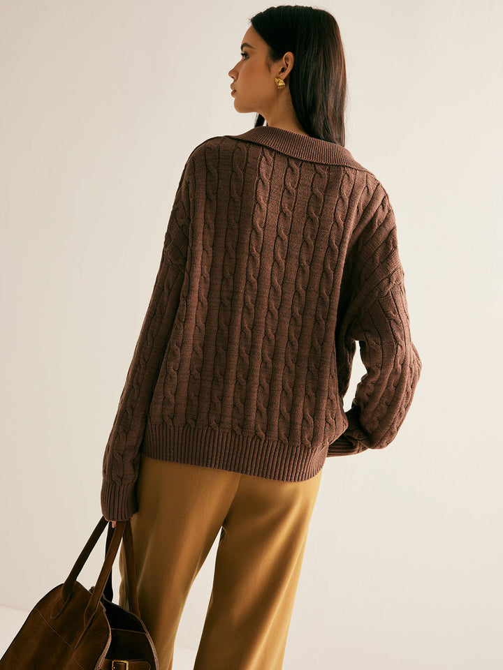 Stylish women's brown V-neck knit sweater. Comfortable long sleeve jumper, versatile for casual or layered outfits.