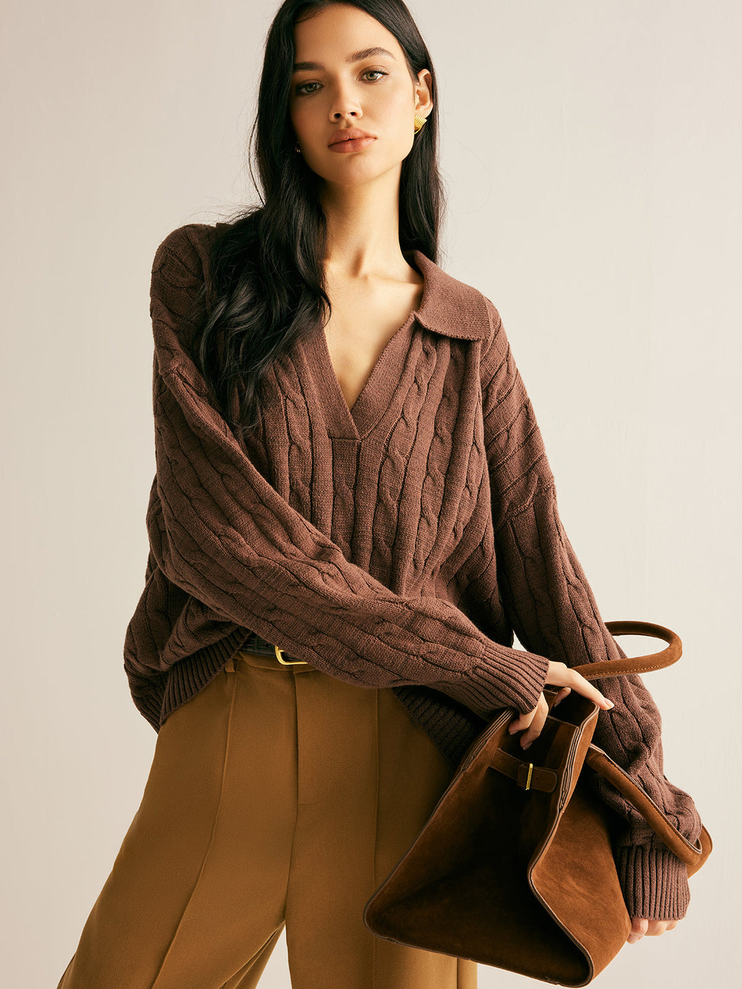 Sienna brown V-neck sweater for women. Cozy knit jumper with long sleeves, ideal for comfortable casual styling.