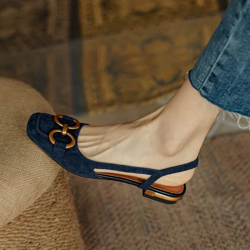 Detail of comfortable slingback strap on women's flats, providing a secure, slip-on fit for everyday wear.