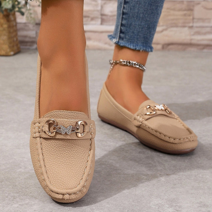 Women's comfortable slip-on loafers, ideal for everyday wear. Stylish and easy to put on, neutral round toe design.