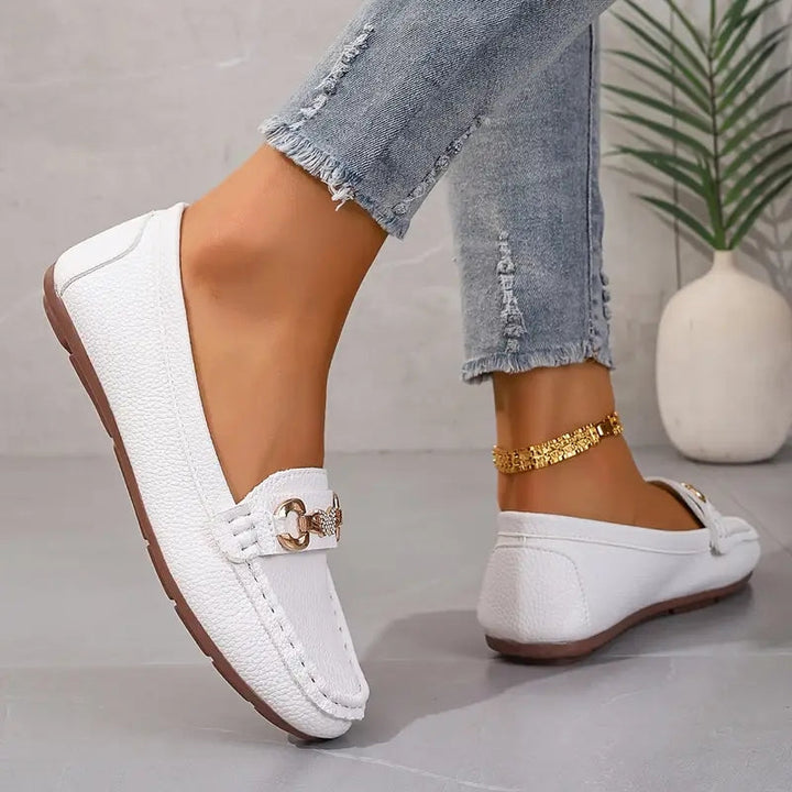 Neutral women's slip-on loafers, comfortable and stylish. Versatile footwear for casual or office wear, round toe.