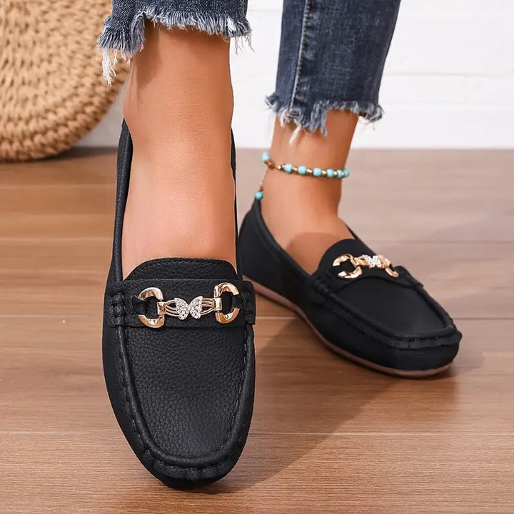 Stylish and comfortable women's slip-on loafers. Elegant round toe footwear, perfect for casual or office style.