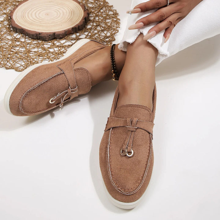 Chic Mira women's slip-on loafers, comfortable and elegant flats for everyday style. Fashionable fall footwear.