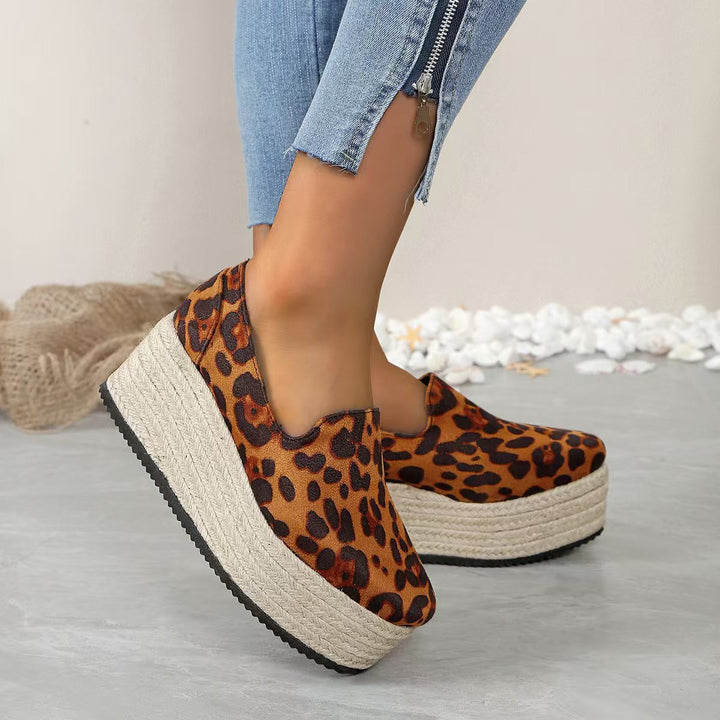 Leopard print women's slip-on platform shoes, adding a trendy touch to any outfit.