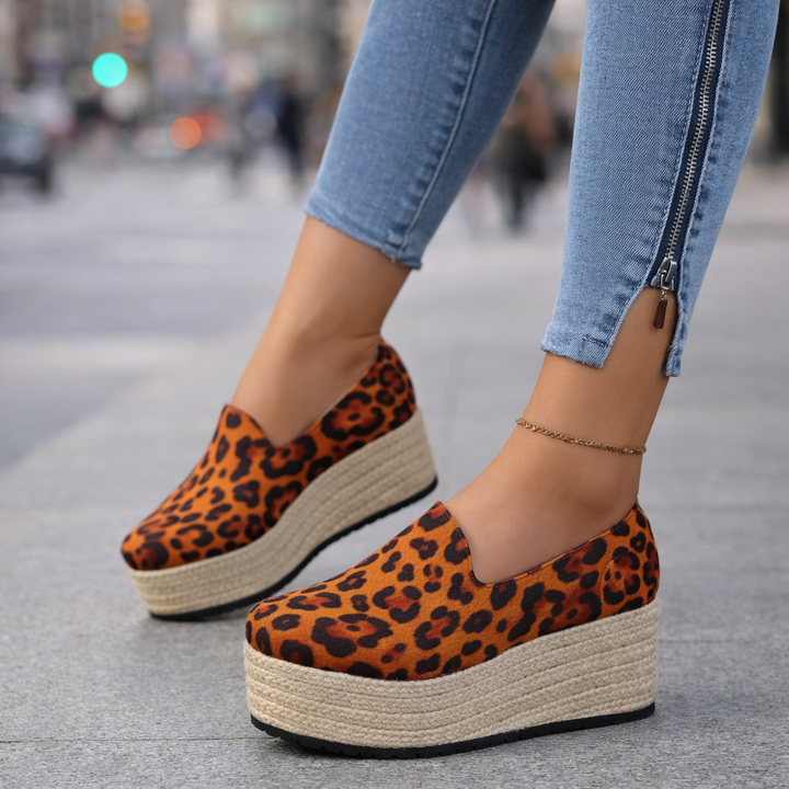 Leopard print women's slip-on platform shoes, stylish & comfortable.