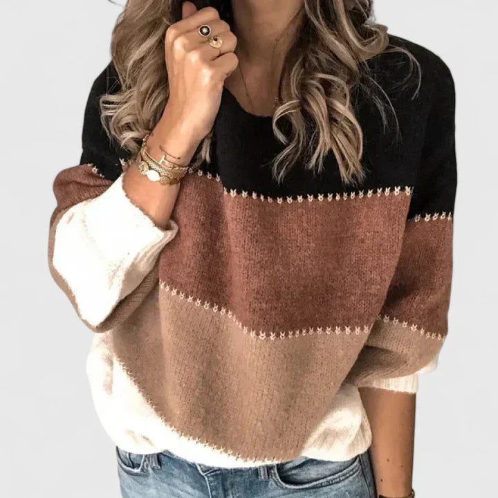 Chic women's striped pullover sweater, a cozy long sleeve round neck top for fall and winter fashion.