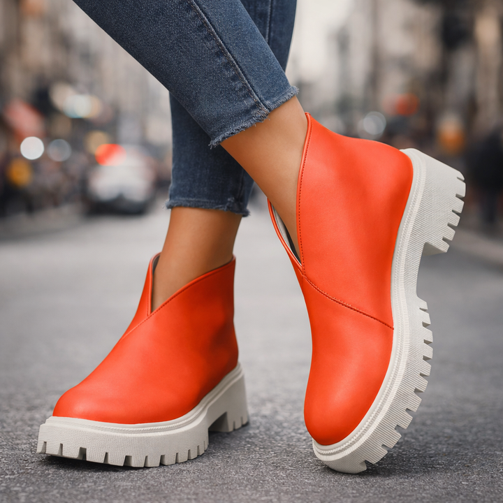 Orthopedic-friendly women's leather platform slip-on sandals, designed for comfort and casual fashion.