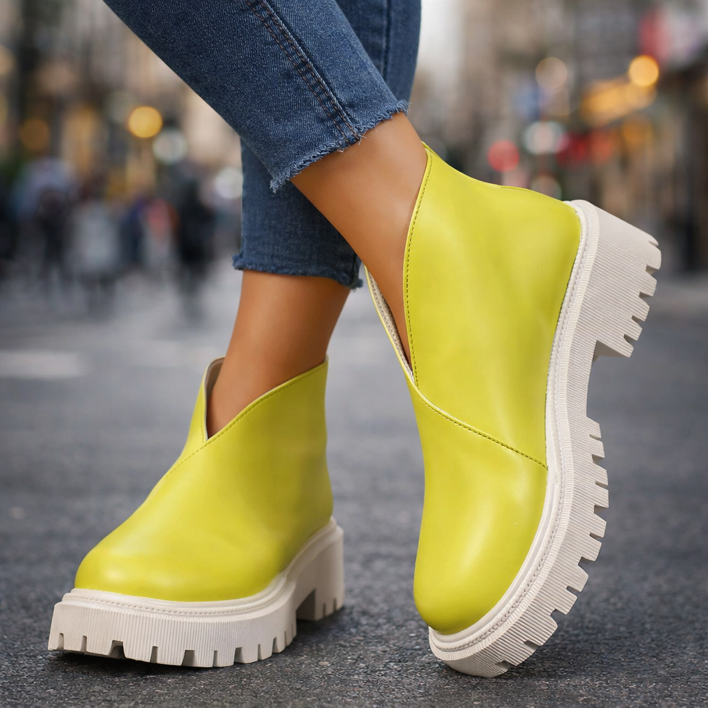 Colorful women's leather platform slip-on sandals, a comfortable and trendy choice for casual footwear.