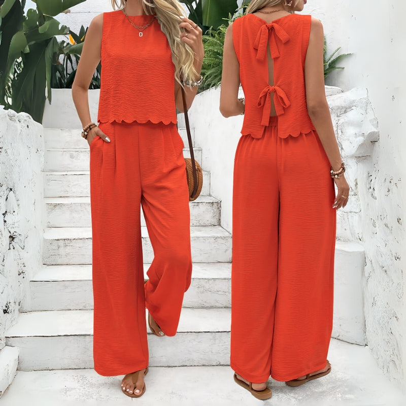 Casual women's two-piece lounge set. Comfortable sleeveless top & elastic waist shorts, a stylish summer outfit.