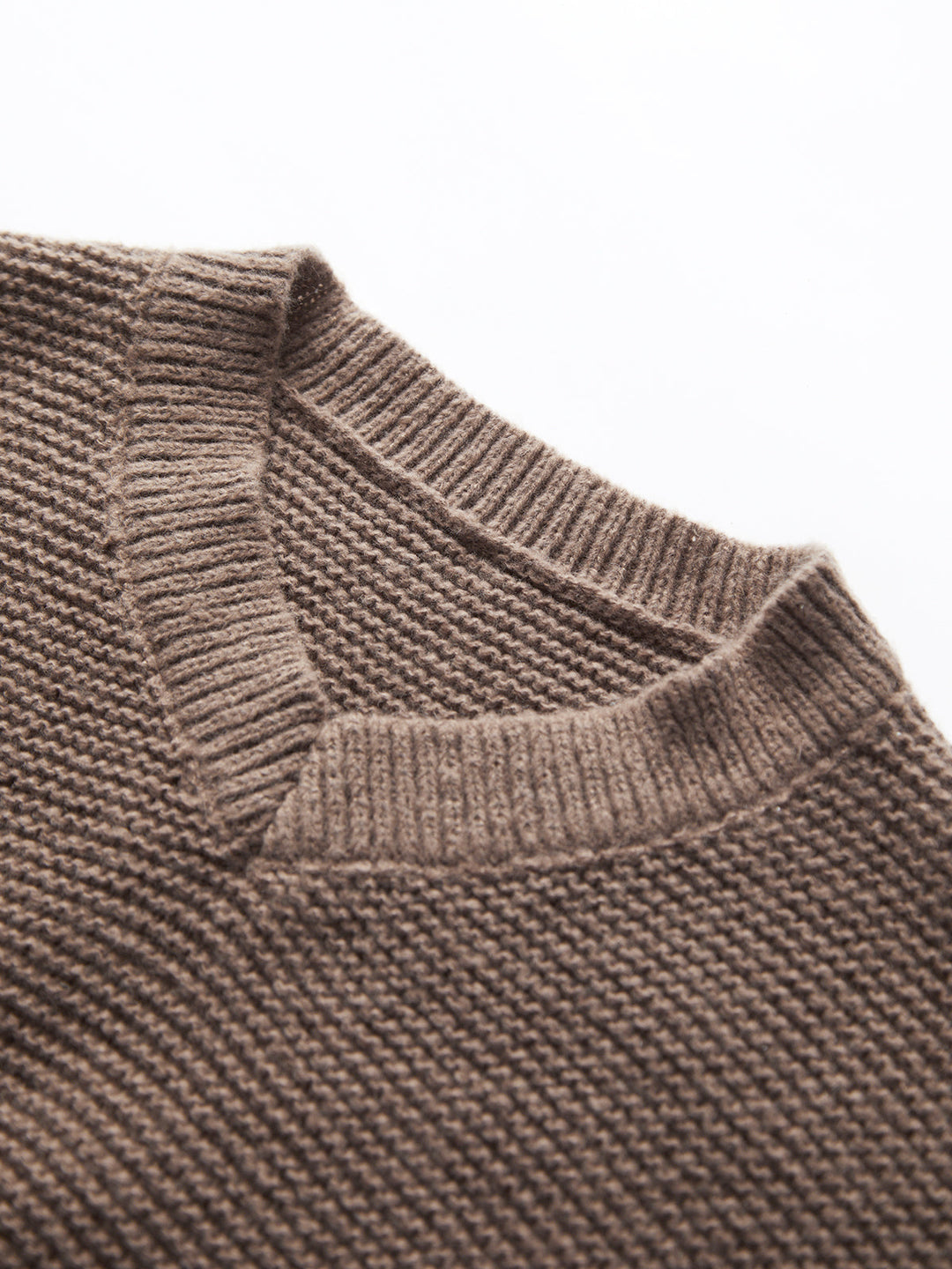 Versatile women's V-neck pullover. Chic knit sweater, designed for comfortable wear and everyday style.