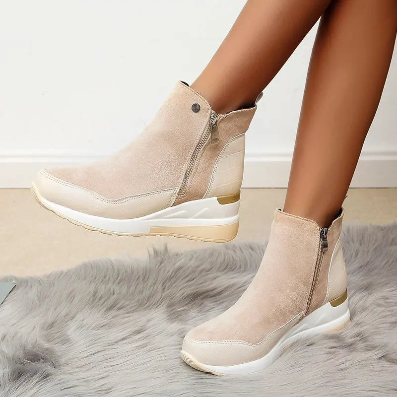 Women's comfortable wedge ankle boots for stylish everyday wear. Cushioned for fall & winter fashion.