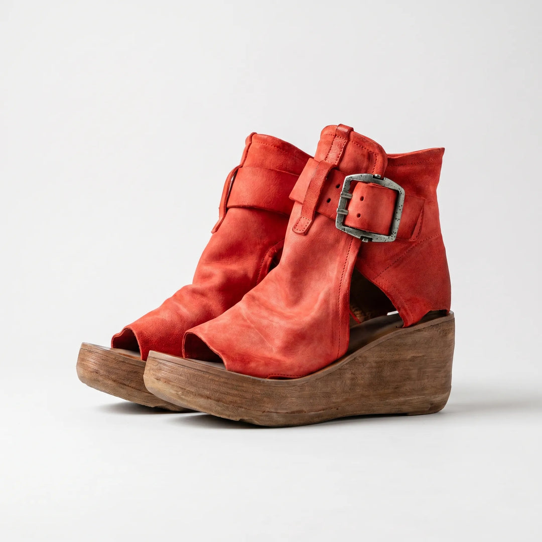 Fashionable women's ankle strap wedge sandals. Comfortable platform heels for versatile summer style & casual wear.