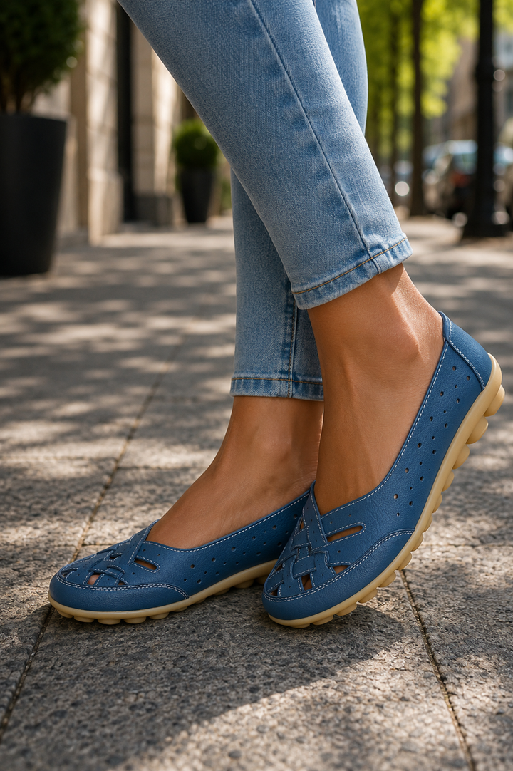 Versatile women's white slip-on ballet flats for everyday comfort and casual styling. Essential summer footwear.