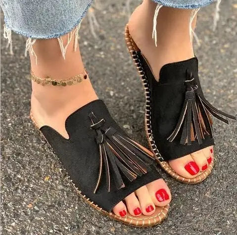Black women's woven cushioned sandals, providing ultimate comfort for all-day wear. Easy slip-on design.