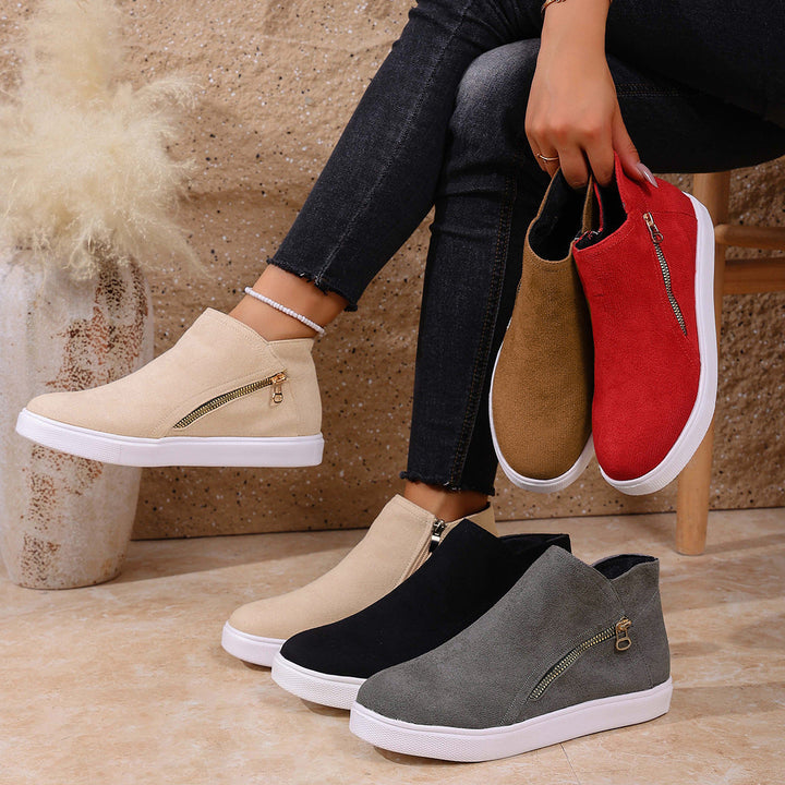 Versatile women's casual footwear with zip closure, offering orthopedic support for everyday comfort.