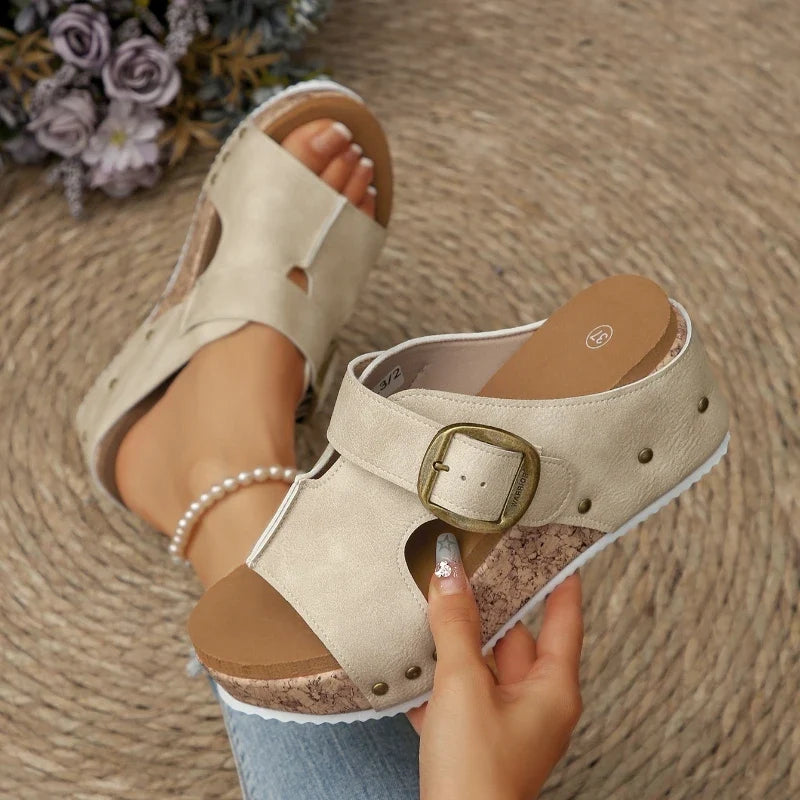 Women's supportive slip-on cork sole slides, ideal summer shoes with comfy orthopedic support.