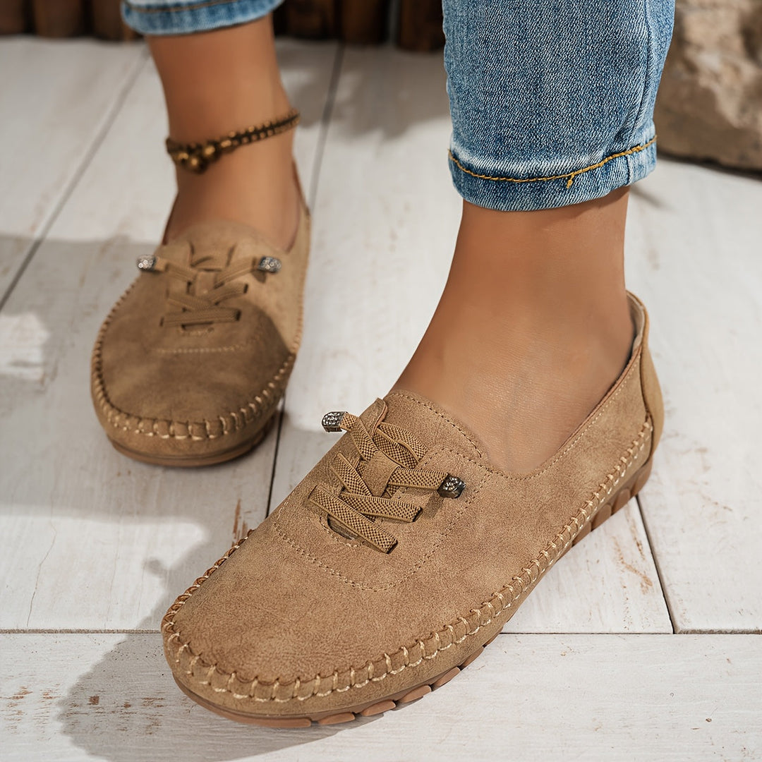 Lightweight women's slip-on shoes with soft fabric upper & arch support, perfect for sensitive feet.