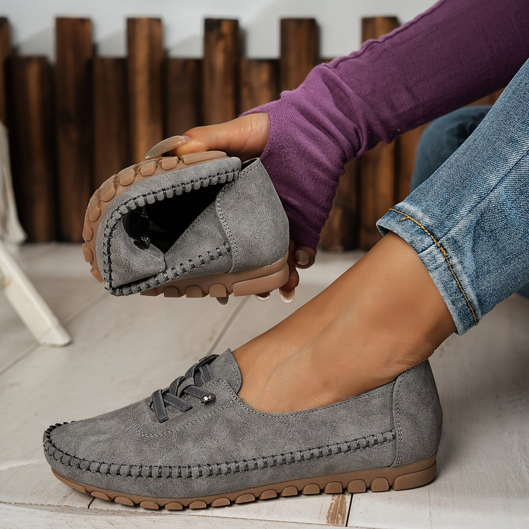 Women's slip-on shoes providing pain relief for sensitive feet, featuring excellent arch support & comfort.