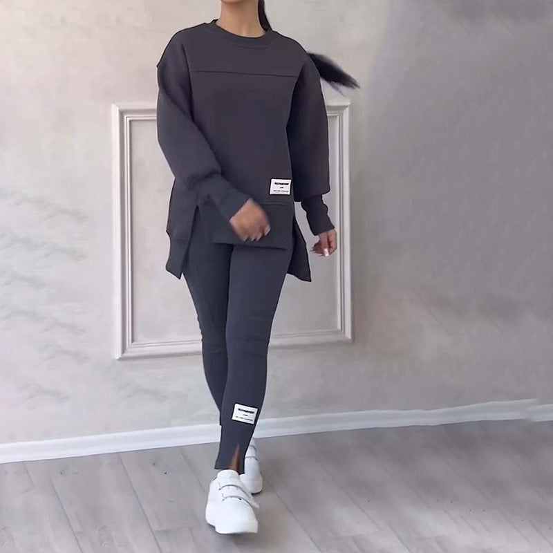 Women's two-piece casual outfit with a comfy oversized hoodie & seamless leggings, a versatile fashion set.