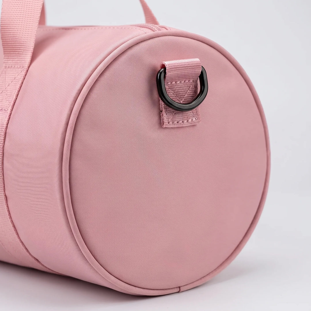 Water-resistant gym duffel bag for women, ideal compact size for daily workouts & sports.