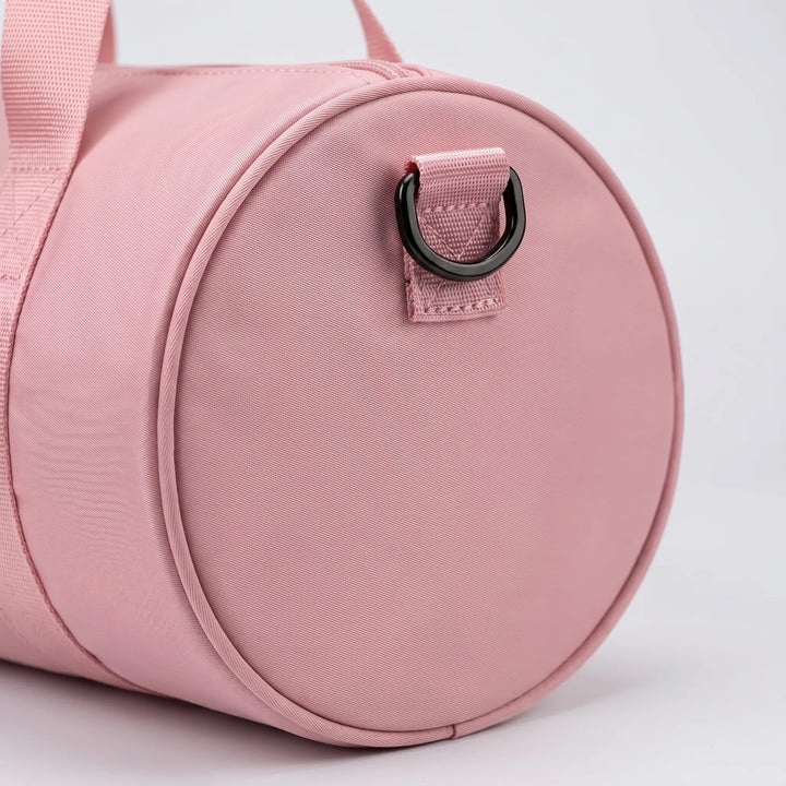 Water-resistant gym duffel bag for women, ideal compact size for daily workouts & sports.