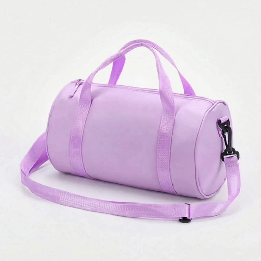 Modern women's workout bag, water-resistant nylon, compact design for gym & travel comfort.