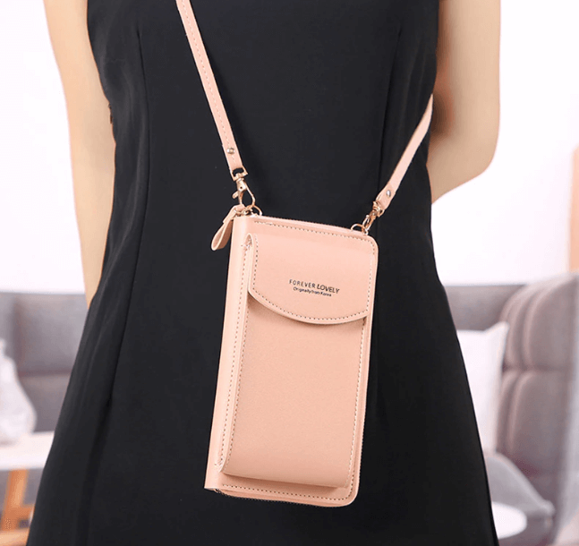 Close-up of the adjustable strap on a compact PU leather shoulder bag, detailing its buckle