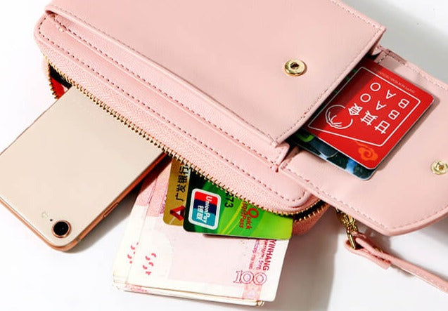 Fashion shot of a woman with a compact PU leather crossbody bag, enhancing her casual outfit