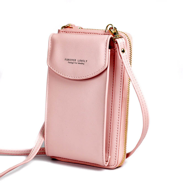 Woman wearing a compact black PU leather shoulder bag, demonstrating its comfortable fit & size