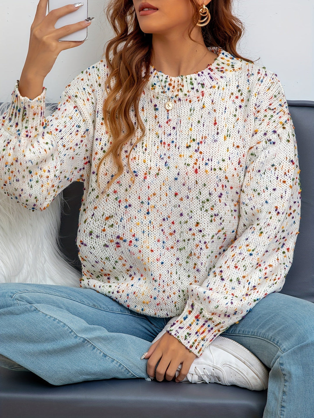 Detail of the round neckline on the Martina women's confetti knit sweater, soft acrylic wool, cozy winter fashion.