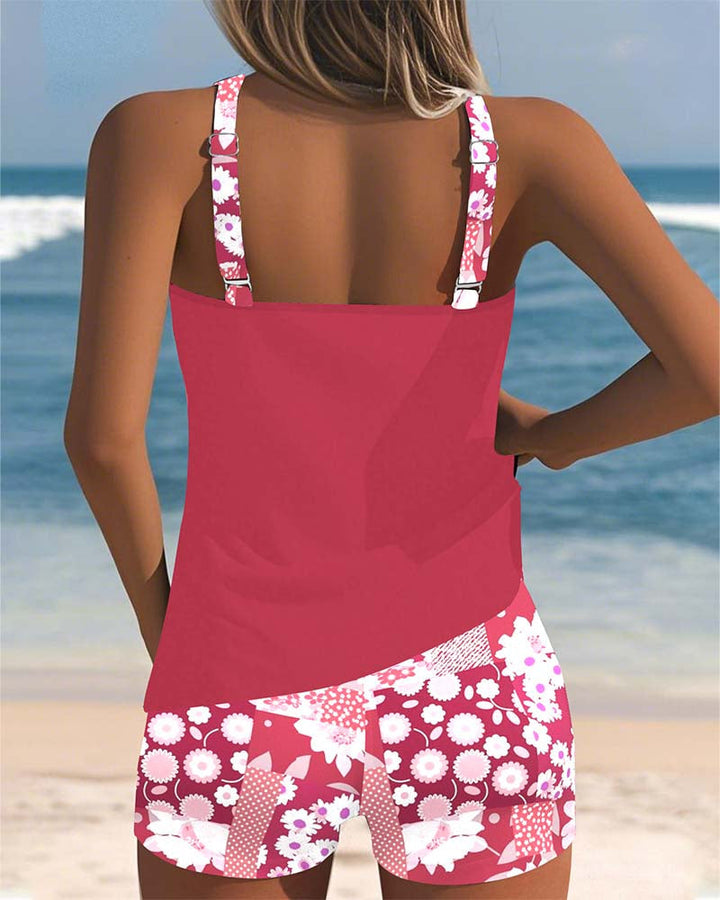 Fashionable women's practical two-piece tankini swim set with swim shorts, offering modest belly coverage.