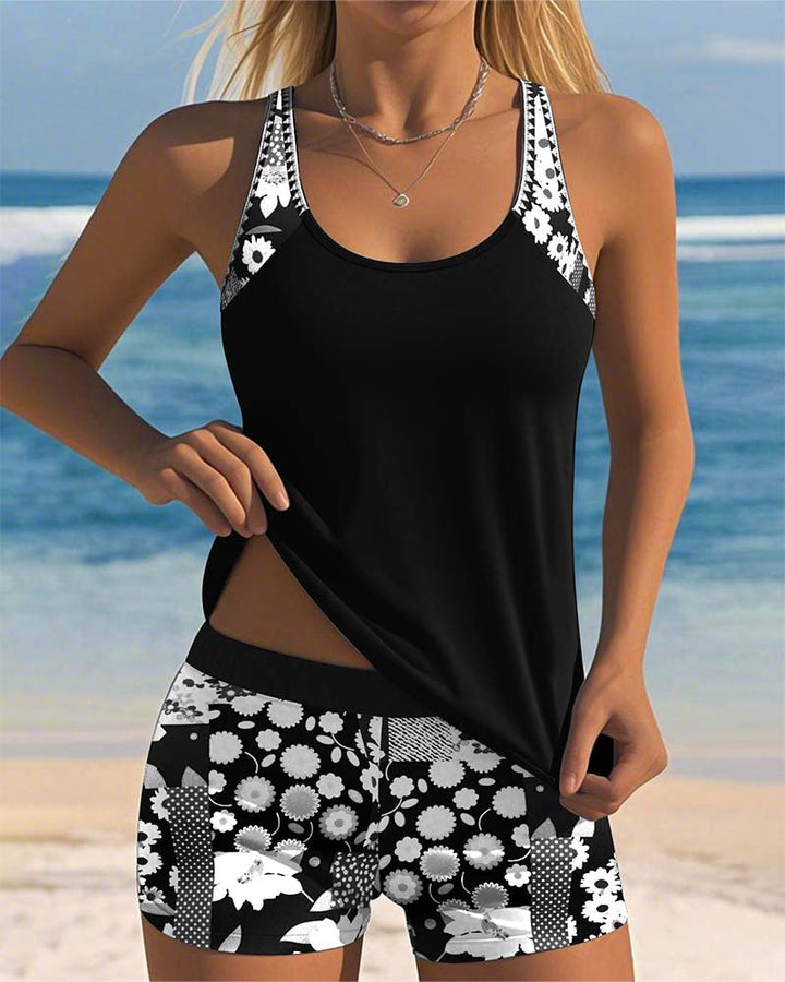 Stylish women's modest tankini swim set with comfortable swim shorts, offering belly-covering confidence.
