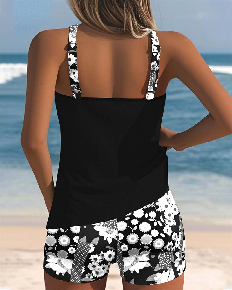 Comfortable women's active tankini swim set with modest swim shorts, designed for belly coverage & summer fun.