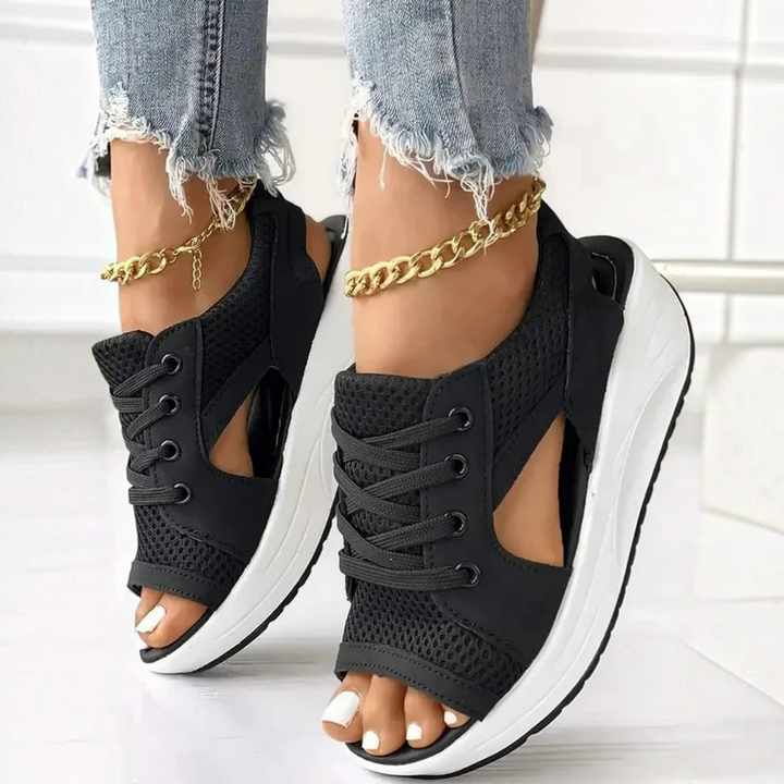 Comfortable women's peep toe cutout sandals with lace-up design & supportive muffin sole for everyday wear.