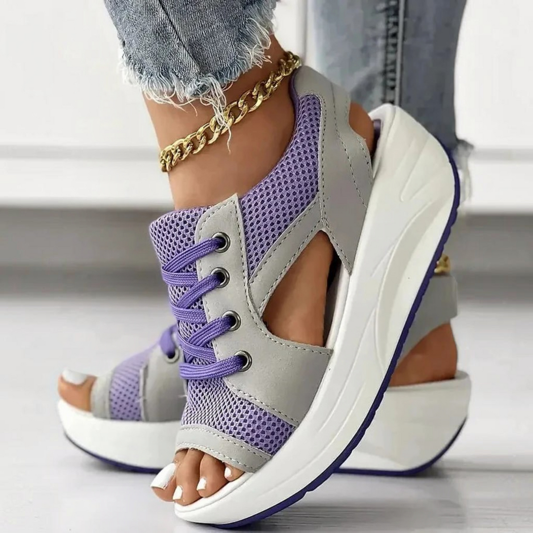 Summer women's lace-up cutout sandals featuring contrast panels & a comfortable muffin sole, ideal for casual outfits.