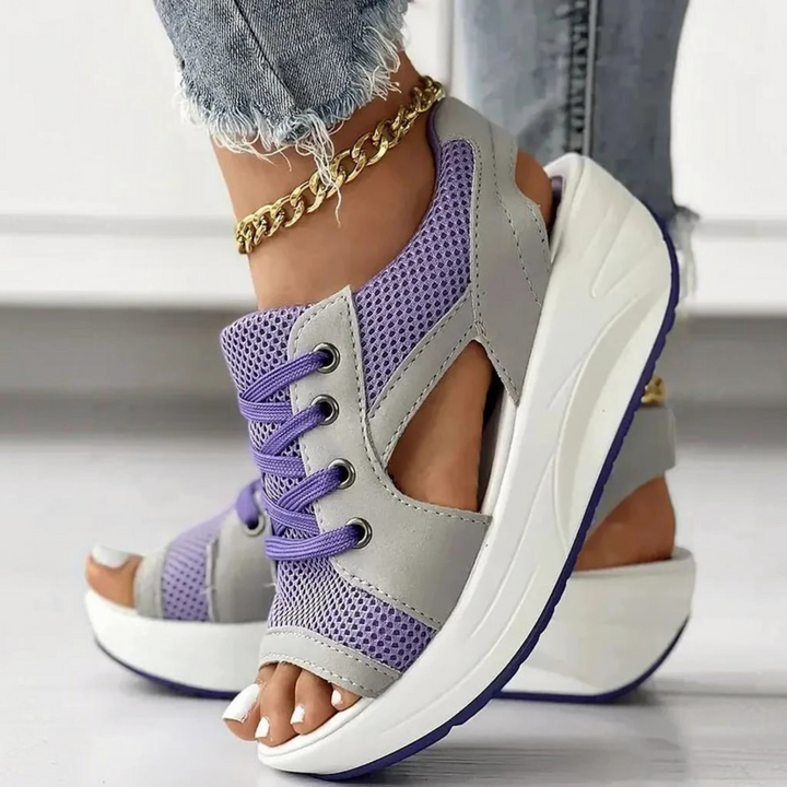 Summer women's lace-up cutout sandals featuring contrast panels & a comfortable muffin sole, ideal for casual outfits.